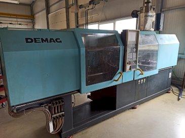 DEMAG Ergotech 150-610 Compact-maskinen sedd från vänster sida